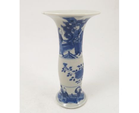 A Kangxi style 18th century vase, of slender baluster form, with flared trumpet neck, decorated with figures and foliage, hei