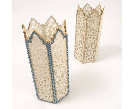 Two Royal Worcester pierced vases, of similar hexagonal form, one with turquoise jewelling, the other with simulated bamboo g