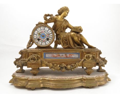 A 19th century French gilt metal mantel clock, the porcelain dial decorated with a band of flowers with gilt Roman numerals t
