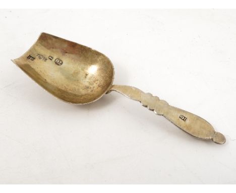 A Russian silver caddy spoon, with engraved decoration to the back of the gilt wash bowl, having a hollow handle, marked to i