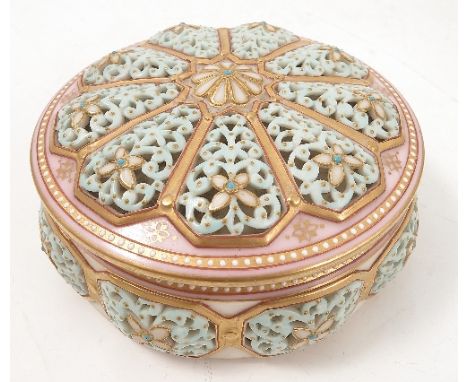 A Royal Worcester pierced covered circular box, with turquoise and pink pierced panels and jewelling, shape number 318, diame
