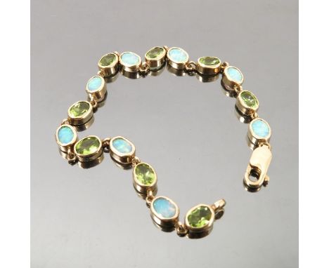 An opal and peridot 9ct gold bracelet, the sixteen stones alternate set, length 20cm, weight 10.9g gross 