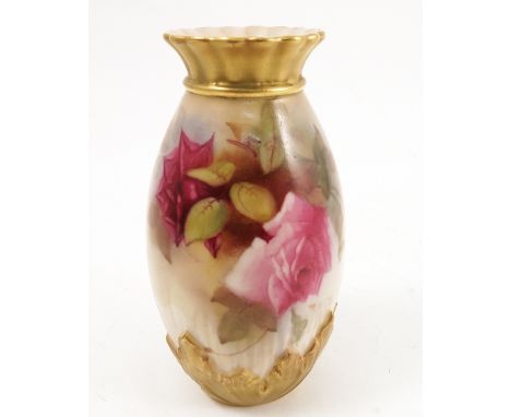 A Royal Worcester vase, decorated with roses, to a ribbed and gilded leaf body, shape number G1039, circa 1916, height 5.5ins