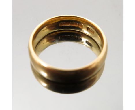 A 22ct gold plain wedding ring, width 4.5mm, shallow D section, finger size K 1/2 leading edge, weight 5.8g gross 