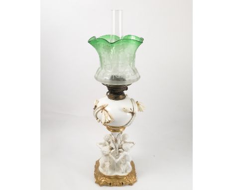 A 19th century Moore porcelain oil lamp, the porcelain oil reserve encrusted with flowers, raised on a floral encrusted colum