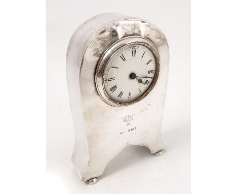 A silver mounted mantel clock, the front engraved with a K below a coronet, Birmingham 1906, raised on ball feet, height 6.5i