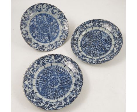 Three Chinese Kangxi plates, decorated with stylized centre to an arcaded border, diameter 8.5ins Condition report: two crack