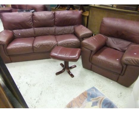 A modern Italian leather upholstered five piece lounge suite, comprising three seat sofa, two seat sofa, two chairs and a foo