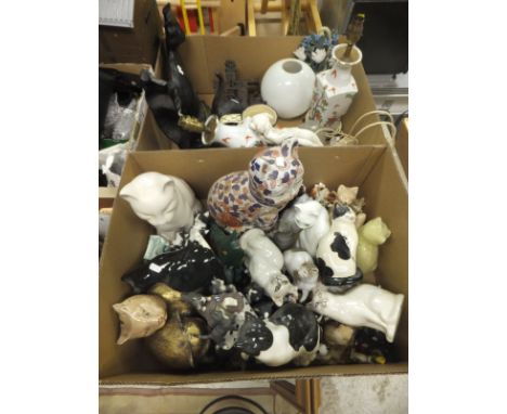 A box containing various cat figurines and a box containing assorted cat doorstops, cut glass light fitting and a pair of Chi