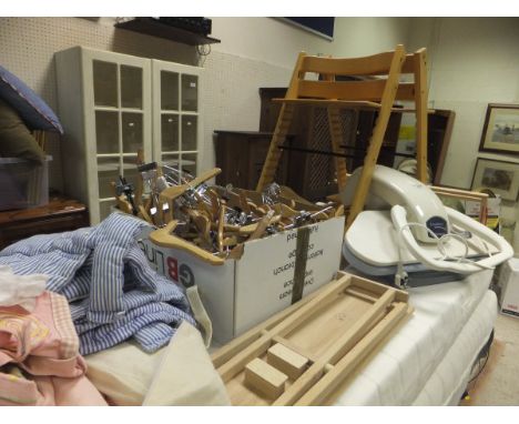 A box of assorted wooden coat hangers, together with an Excellence Domena iron, various textiles, a child's toy ironing board