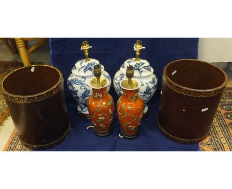 A pair of modern baluster shaped table lamps with blue and white trailing foliate decoration, a pair of Oriental style table 