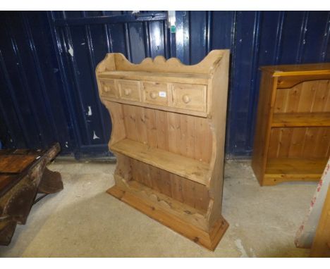 A pine two shelf wall hanging unit with two drawers below, together with a small pine gate-leg coffee table and a pine box