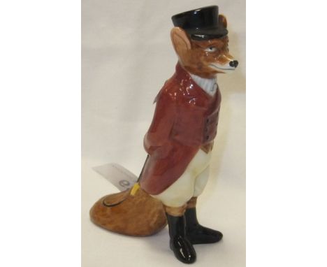 A Royal Doulton porcelain figure of a fox dressed as a huntsman wearing hunting pinks and black top hat, model 6448