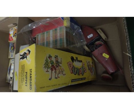 A Meccano Limited Clockwork Constructor Racing Car (for restoration), together with a box containing various vintage puzzles 