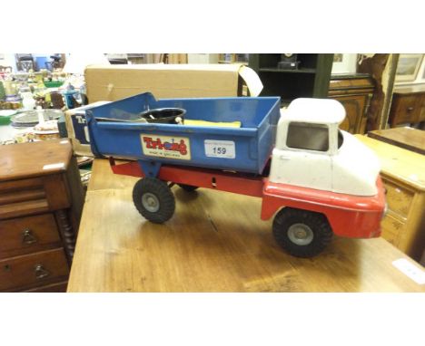 A vintage Tri-ang dumper truck, a Tri-ang Jones KL44 crane model (boxed), together with a Tri-ang ocean liner RMS Pretoria Ca