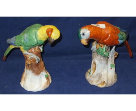 Two Dresden porcelain parrot figures, each raised on a naturalistic tree stump CONDITION REPORTS Appear to be in sound condit