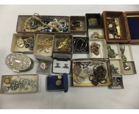 A quantity of various costume jewellery to include necklaces, earrings, bracelets, brooches, lockets, etc, together with an o