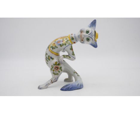 A hand painted majolica Louis Wain style ceramic cat. H.24cm 