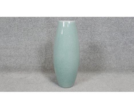 A large celadon glaze ceramic vase. H.47 Diam.18 