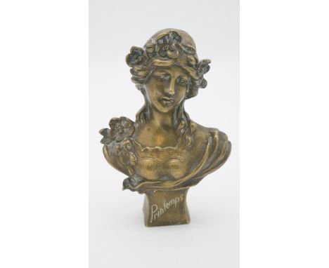 An Art Nouveau style brass bust of a maiden titled 'Le Printemps'. 