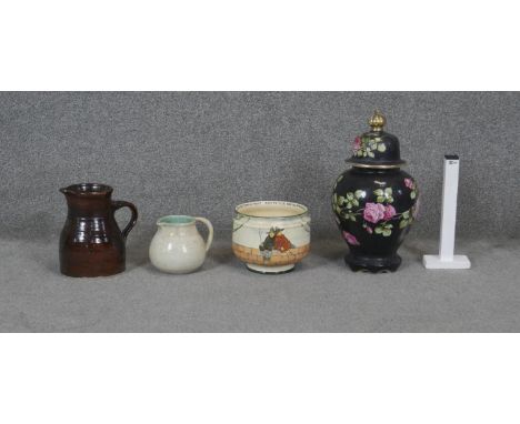 A collection of studio pottery. Including an A G Harley Jones hand painted ceramic lidded jar, decorated with roses, a signed