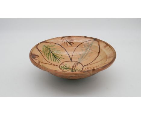 A Bamiyan style ceramic hand painted floral design bowl.&nbsp;Diam. 28cm