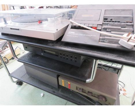 A Yamaha tape deck, record player, and other recording equipment on trolley/stand