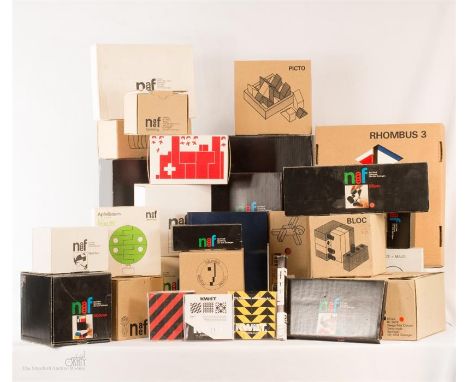 A group of geometric puzzles by Naef, Spielzeug c.1980s. Bauhaus, Panton and architectural cubist modular design with book, i