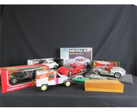 A Revell Metal Kit, A Dinky Citroen Presidential, Burago Ferrari, Porcehe, and large model of Routemaster bus. 