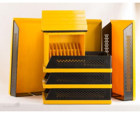 A group of Rexite Storage pieces of Italian design: a Biblio tape holder by Giotto Stopino, a Podio Rino Pirovano, and six st