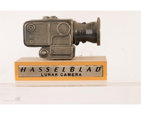 A Hasselblad model Lunar Camera on pine plinth; length 9.3cm, height 7cm.