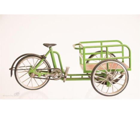 A scale model of a green painted tradesmans bicycle by Patentado. 