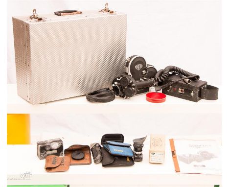 Vintage Arriflex 16st motion picture camera in metal carry case with accessories and instructions 