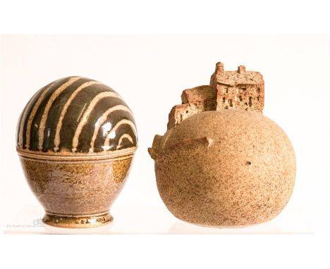 An ovoid pottery trinket box by J Young and stoneware model of cottages on a hill.
