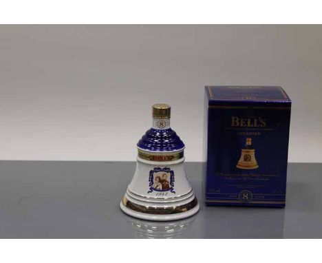 BELL'S ROYAL 50TH WEDDING ANNIVERSARY BELL
Blended Scotch Whisky in white and blue Wade ceramic decanter. 70cl, 40% volume, i