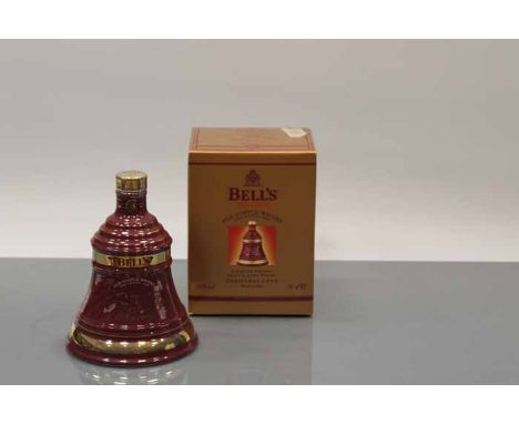 BELL'S CHRISTMAS 1999 BELL
Blended Scotch Whisky in russet Wade ceramic decanter. 70cl, 40% volume, in carton. CONDITION REPO