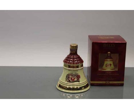 BELL'S CHRISTMAS 1996 BELL
Blended Scotch Whisky in cream russet Wade ceramic decanter. 70cl, 40% volume, in carton. CONDITIO