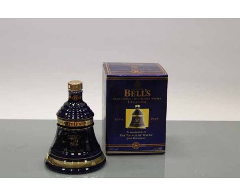 BELL'S PRINCE OF WALES 50TH BIRTHDAY BELL
Blended Scotch Whisky in blue and gold Wade ceramic decanter. 70cl, 40% volume, in 