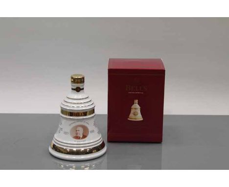 BELL'S CHRISTMAS 2000 BELL
Blended Scotch Whisky in white and gold Wade ceramic decanter. 70cl, 40% volume, in carton. CONDIT