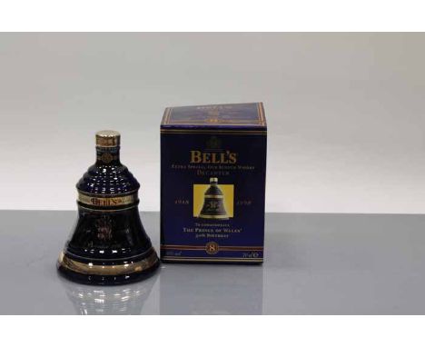 BELL'S PRINCE OF WALES 50TH BIRTHDAY BELL
Blended Scotch Whisky in blue and gold Wade ceramic decanter. 70cl, 40% volume, in 