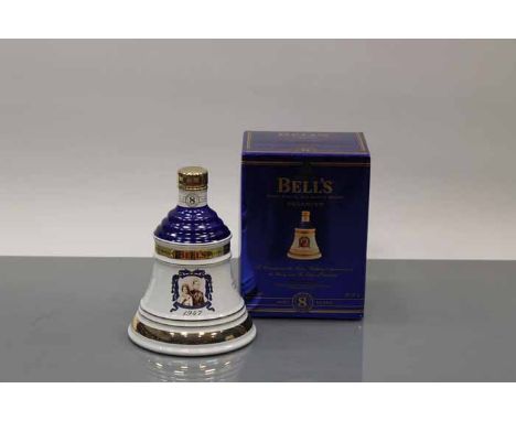 BELL'S ROYAL 50TH WEDDING ANNIVERSARY BELL
Blended Scotch Whisky in white and blue Wade ceramic decanter. 70cl, 40% volume, i