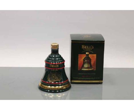 BELL'S CHRISTMAS 1993 BELL
Blended Scotch Whisky in green Wade ceramic decanter. 70cl, 40% volume, in carton. CONDITION REPOR