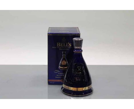 BELL'S QUEEN'S 50 YEARS REIGN BELL
Blended Scotch Whisky in blue Wade ceramic decanter. 70cl, 40% volume, in carton. CONDITIO