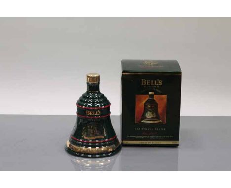 BELL'S CHRISTMAS 1993 BELL
Blended Scotch Whisky in green Wade ceramic decanter. 70cl, 40% volume, in carton. CONDITION REPOR