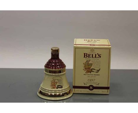 BELL'S CHRISTMAS 1997 BELL
Blended Scotch Whisky in cream and brown  Wade ceramic decanter. 70cl, 40% volume, in carton. COND