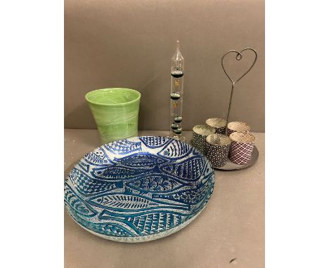 A selection of decorative glass including a thermometer