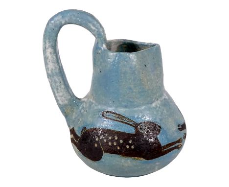 Michele COWMEADOW (British 20th/12st Century) - pottery jug, decorated with running hares on a light blue ground, incised wit