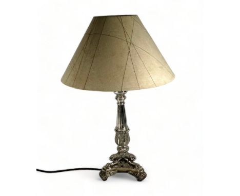 A silver plated neo classical table light - of reeded columnar form and raised on three paw feet, encrusted with fruit and fl