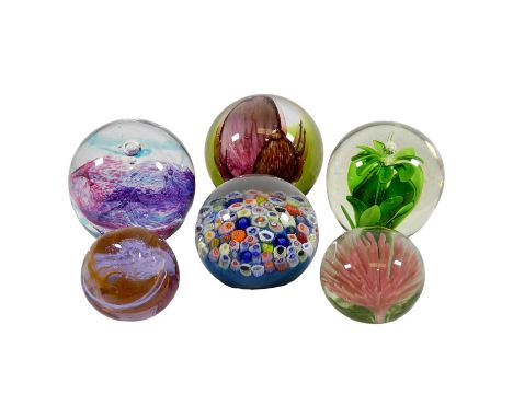 A Caithness glass paperweight - 'Space Orchid', limited edition by Colin Terris, with certificate, diameter 8cm, together wit