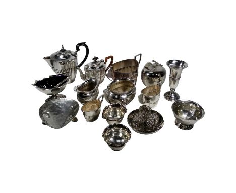 An early 20th century silver plated bachelor tea service - part gadrooned, tea pot with a wicker handle, together with a thre
